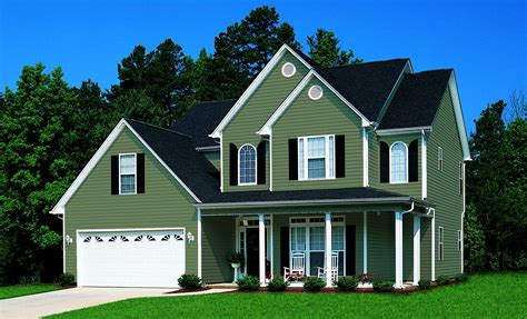 green vinyl house with a green metal roof|green vinyl siding for homes.